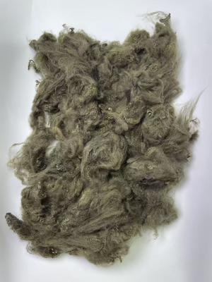 Un buon prezzo. 1.5D Brown Recycled Polyester Staple Fiber with 0.2% Oil Content and 255-265℃ Melting Point in linea